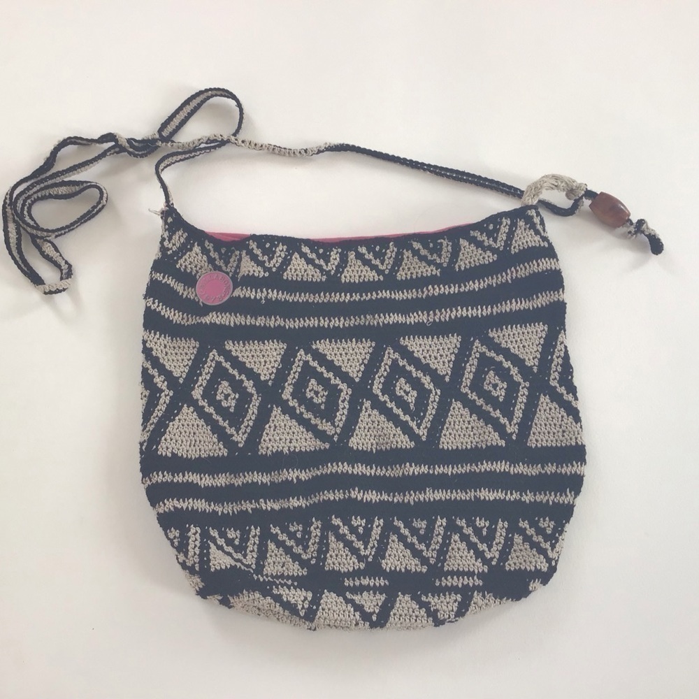 Billabong boho black and gray geometric patterned,lined,crocheted crossbody bag.